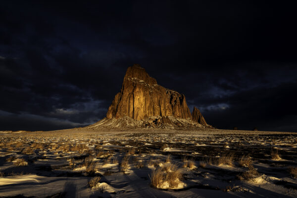 Warm morning sunlight lighting up Shiprock on a freezing cold morning