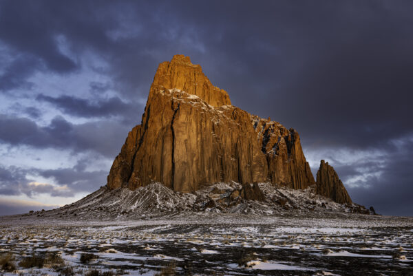 Bright red morning light on Shiprock