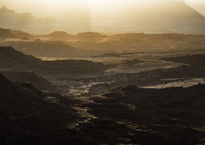 Sunrise through the bottom of Mesa Arch at Canyonlands NP