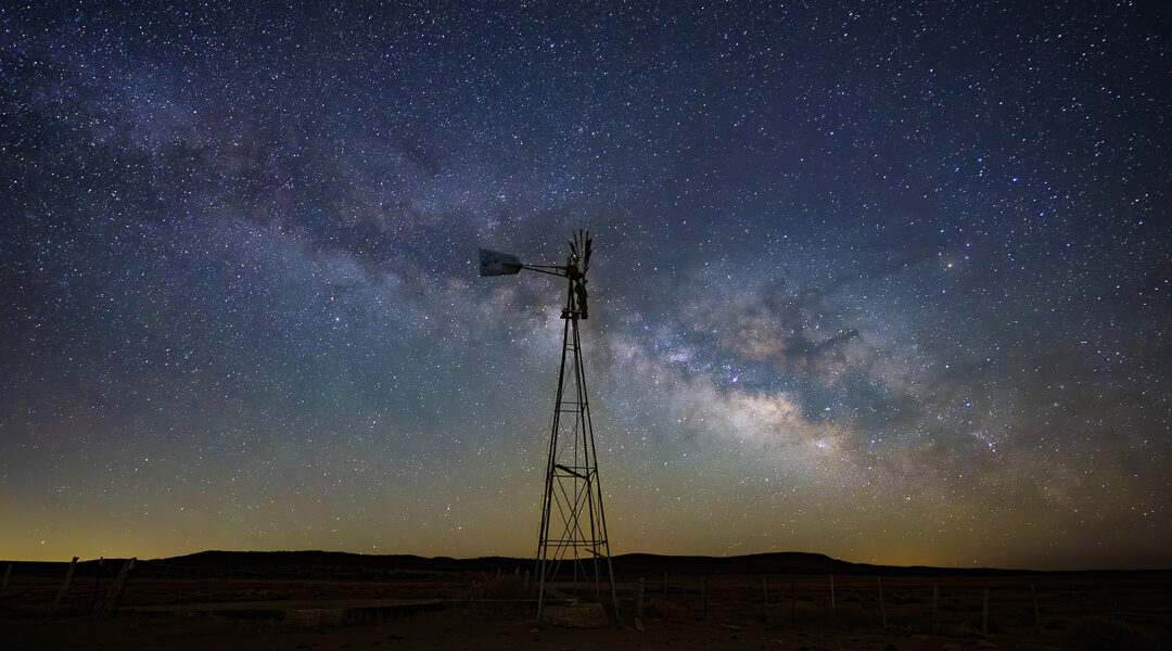 Windmill and Milky Way under a dark New Mexico sky