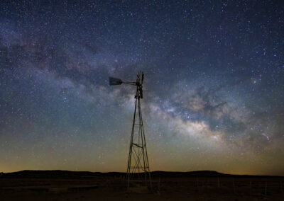 Windmill and Milky Way under a dark New Mexico sky