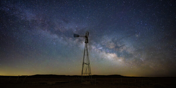 Windmill and Milky Way under a dark New Mexico sky