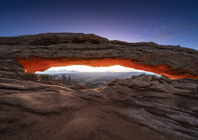 Twilight glow before sunrise at Mesa Arch in Canyonlands NP