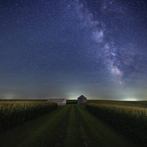 Grain bin and shed under the Milky in Iowa