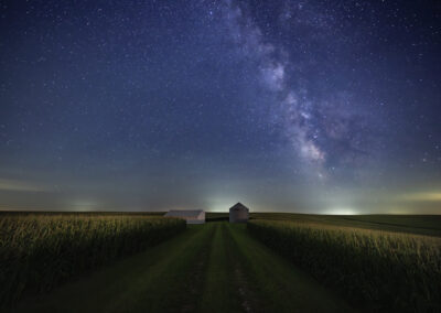 Grain bin and shed under the Milky in Iowa