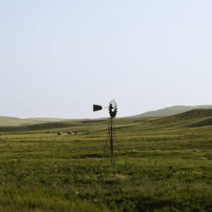 A lone windmill in the middle of the Nebraska Sandhills